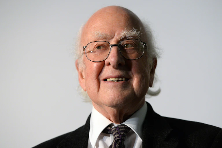 Head and shoulders portrait of grey-haired scientist, Peter Higgs