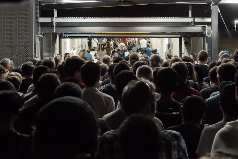 Photo of crowd at railway station.