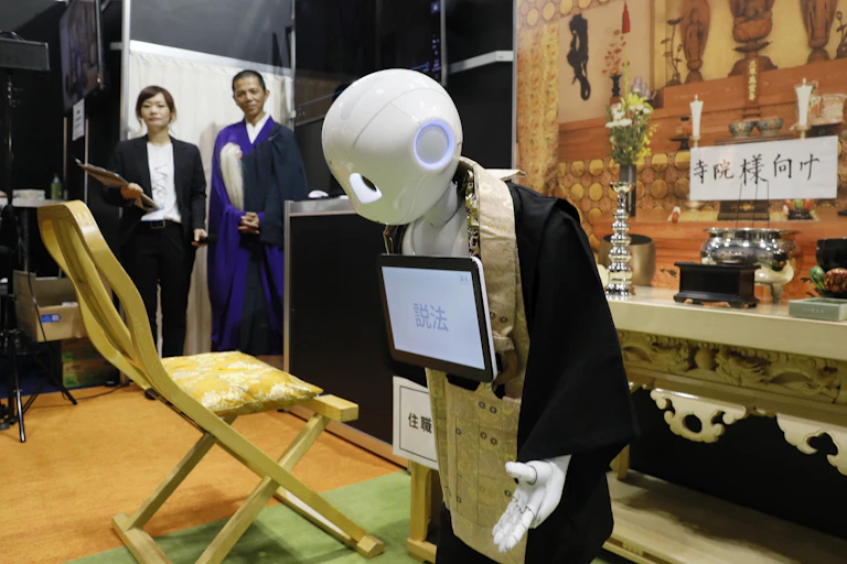 Robot dressed in Japanese gown bows