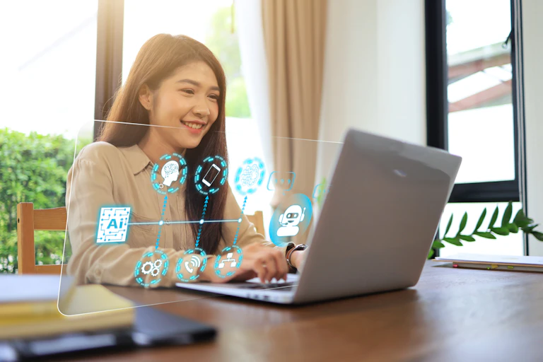 Woman using a laptop.
