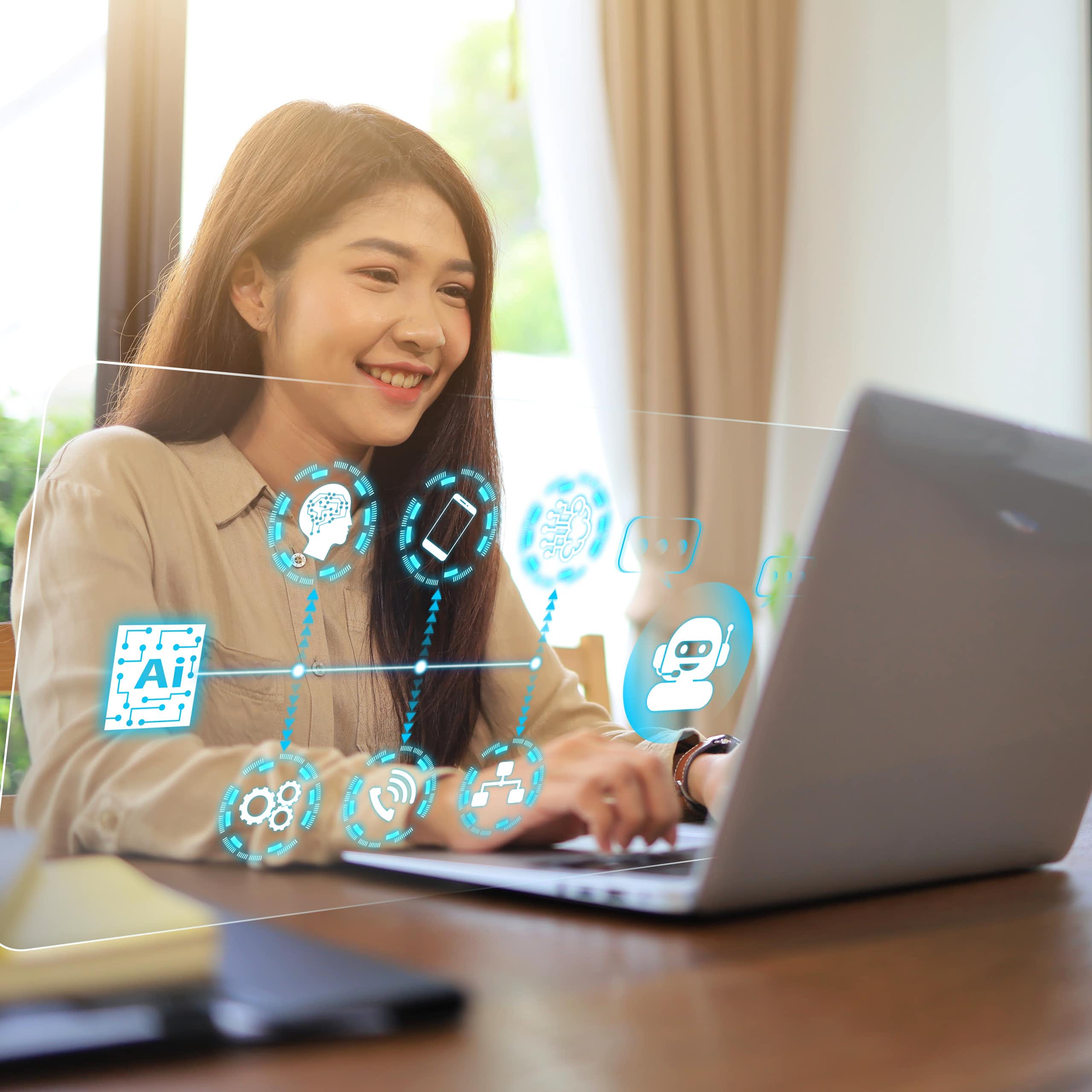 Woman using a laptop.