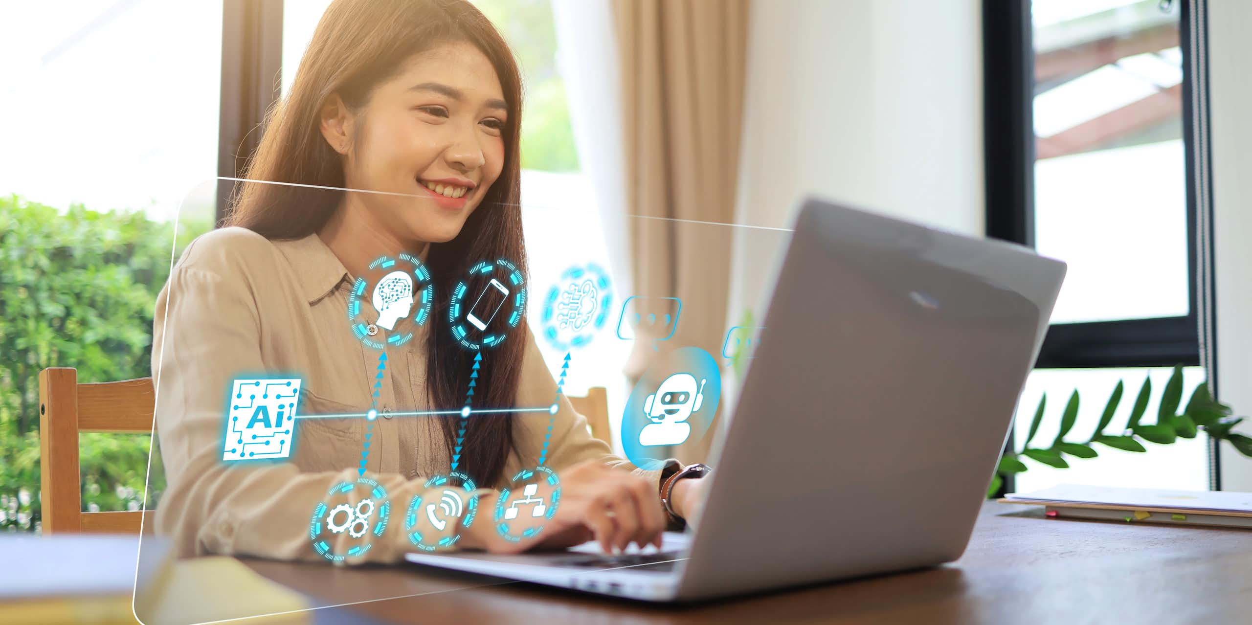 Woman using a laptop.