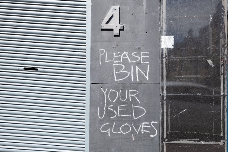 Our analysis presentations COVID-19 made other people admire side road cleaners extra – but it surely additionally made their lives tougher 1 Graffiti on a wall.