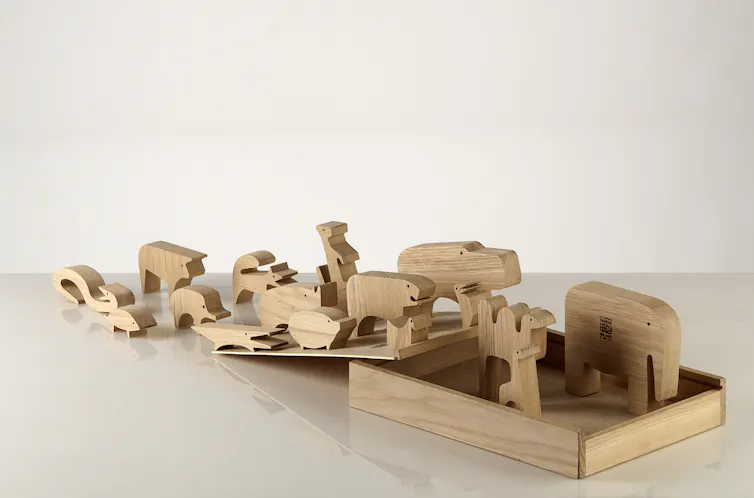 A wooden puzzle of animals that tessalate