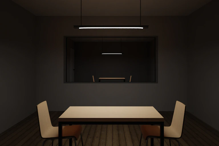 two chairs at a table with observation window into interrogation room