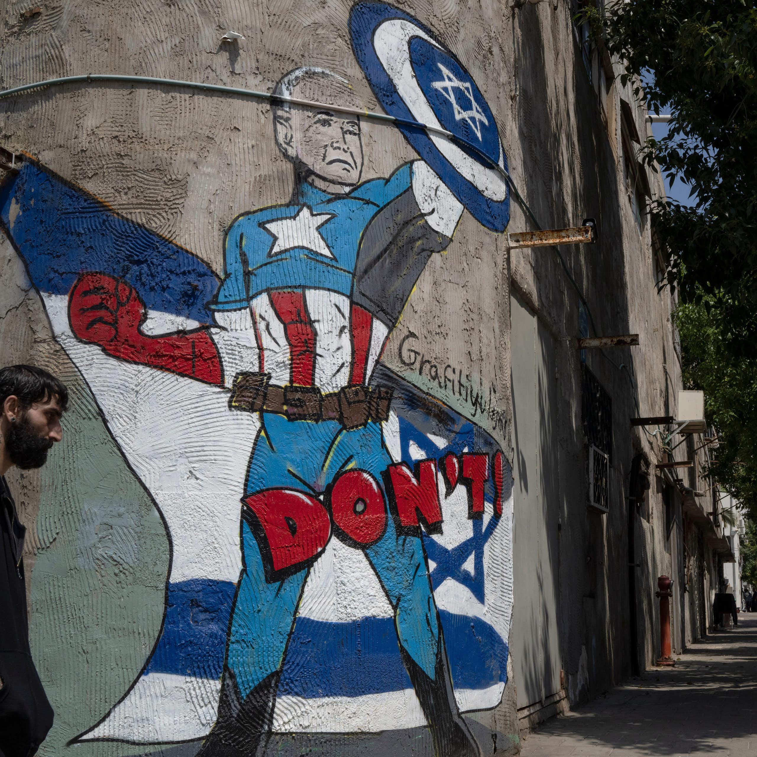 A mural in Tel Aviv depicts US president Joe Biden as a superhero defending Israel.