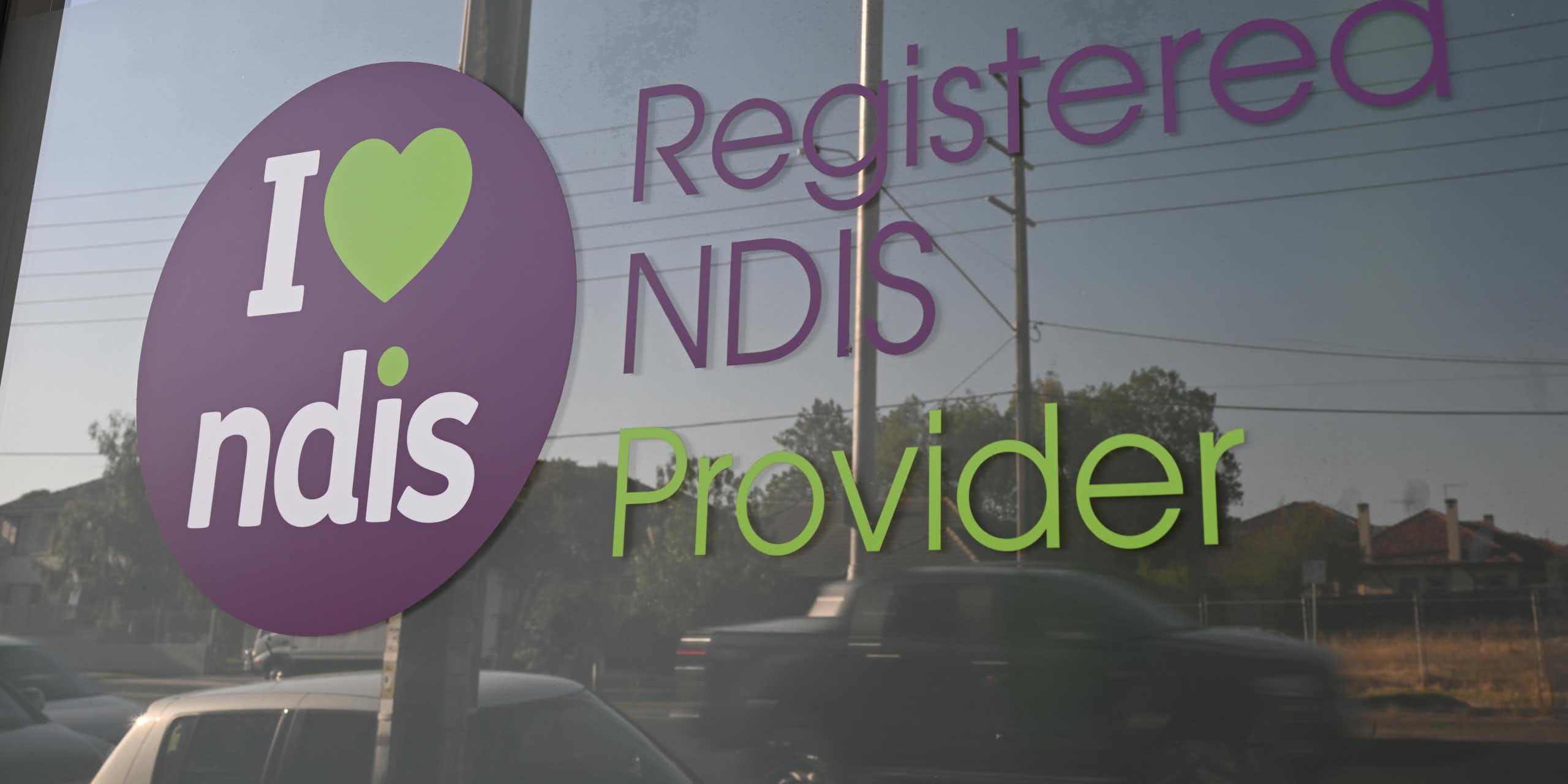 Window with printed lettering that reads: Registered NDIS provider