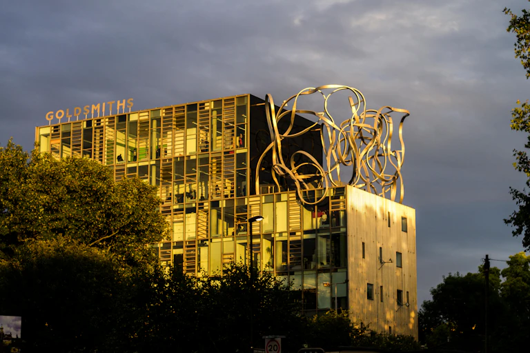 A broody image of Goldmiths University in the later afternoon sun against a gunmetal sky.