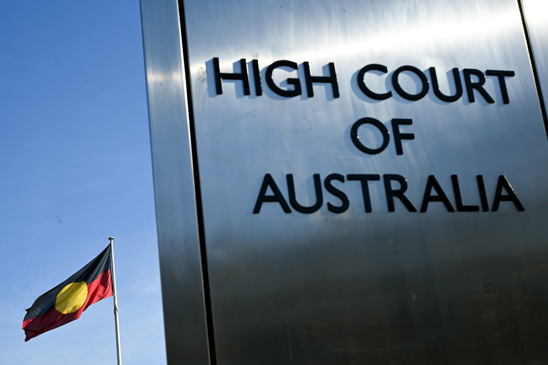 A sign in front of the High Court.