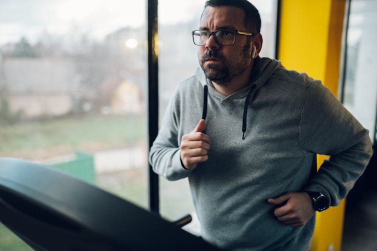Man runs on treadmill
