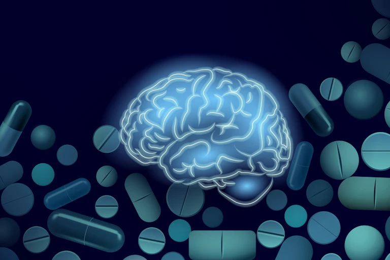 Blue illustration of brain on background of pills and capsules