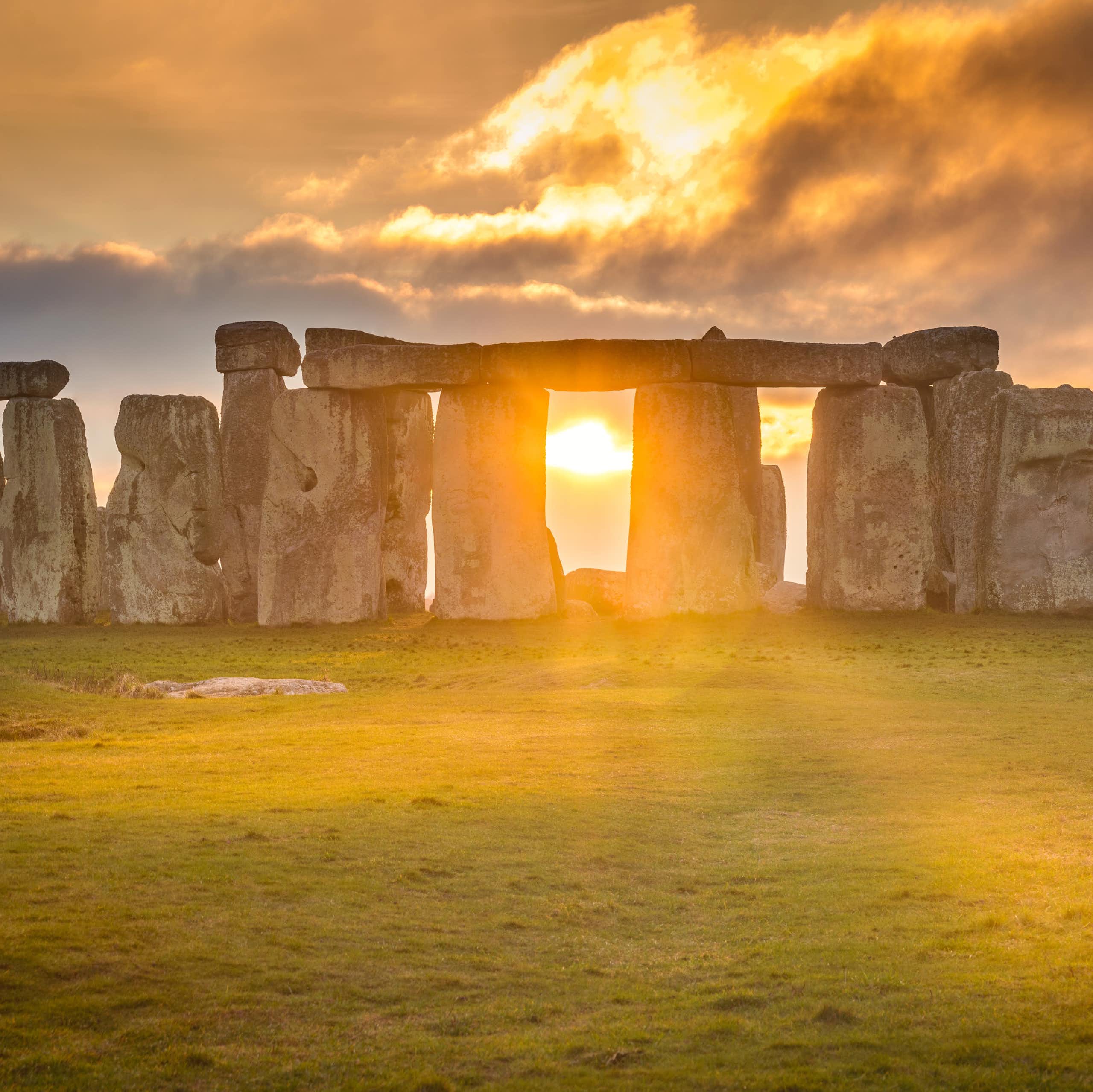 Sun shines through huge stone pillars