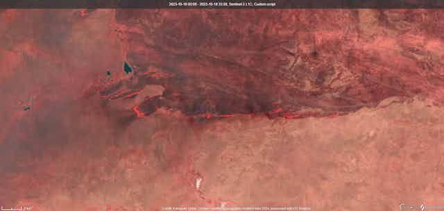 Satellite image showing large fires burning in the desert