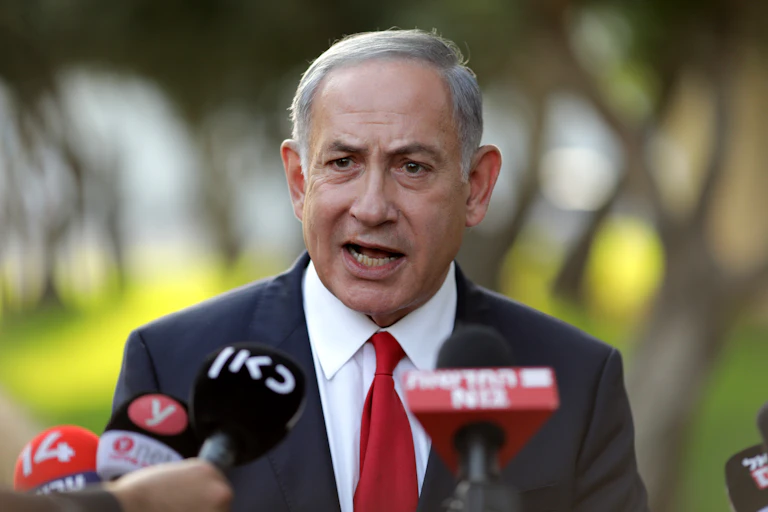 Israeli prime minister Benjamin Netanyahu speaks to journalists