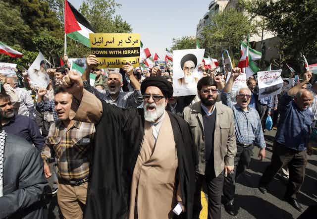 Iranians march in Tehran in protest at the Israeli strike of April 19 2024