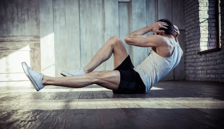 Young man exercising