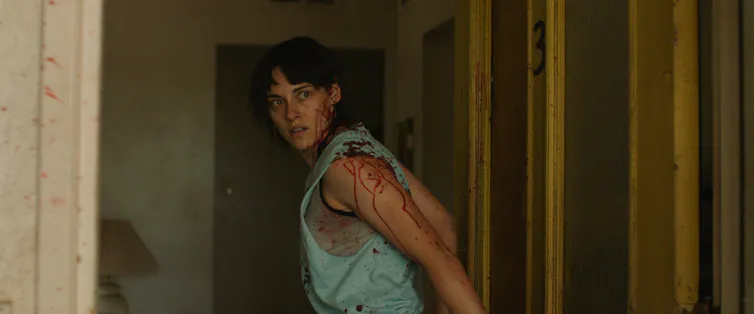 Kristen Stewart covered in blood