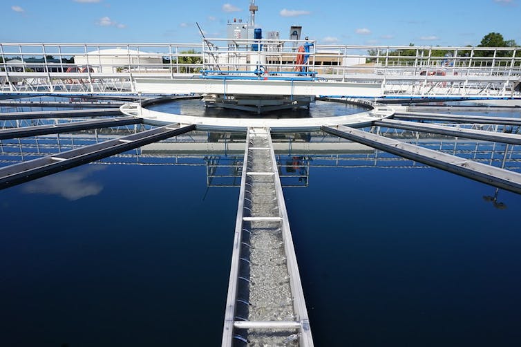 A large tank of water, with fences around the top.