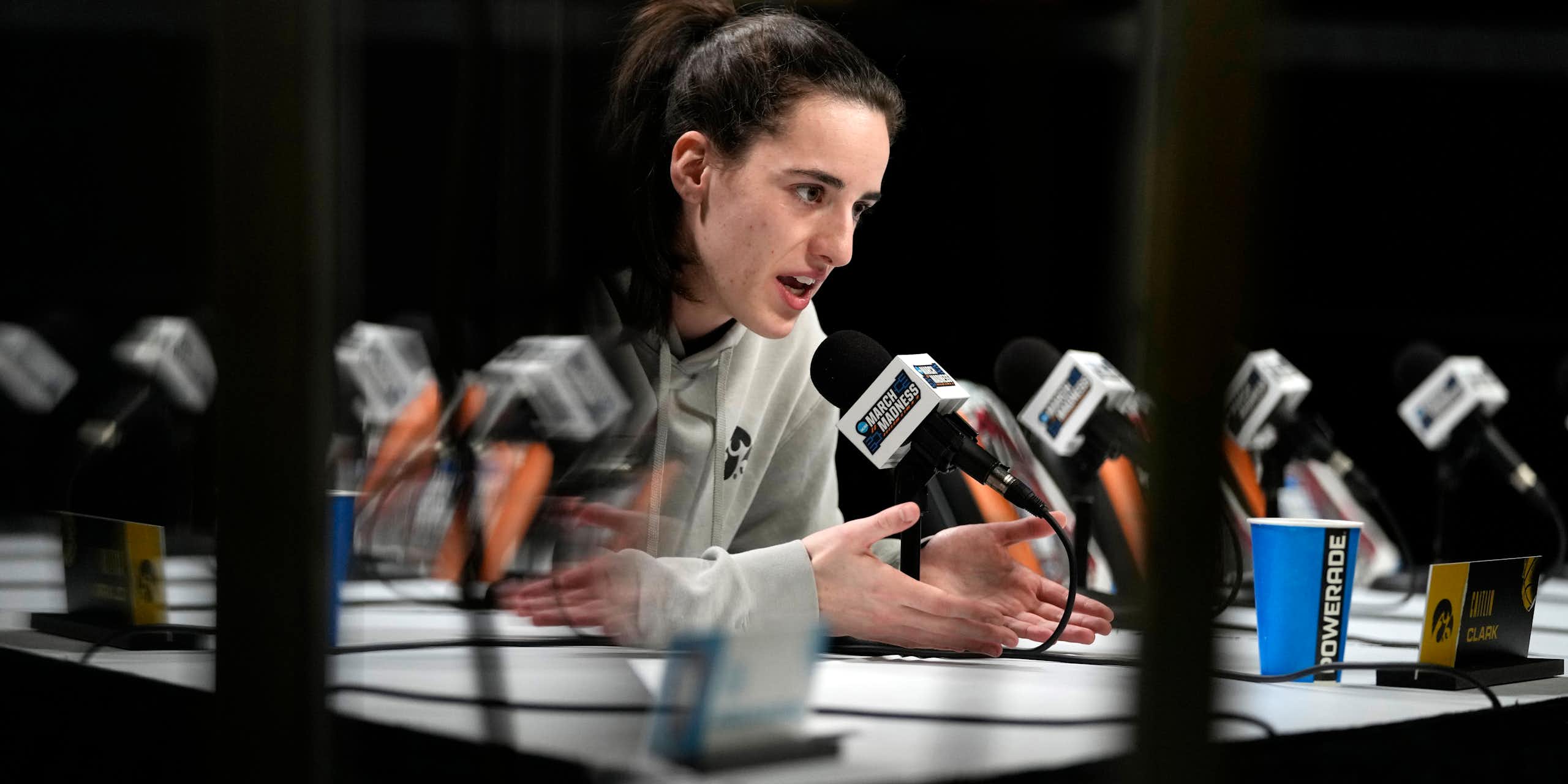 Iowa basketball star Caitlin Clark speaks during a press conference