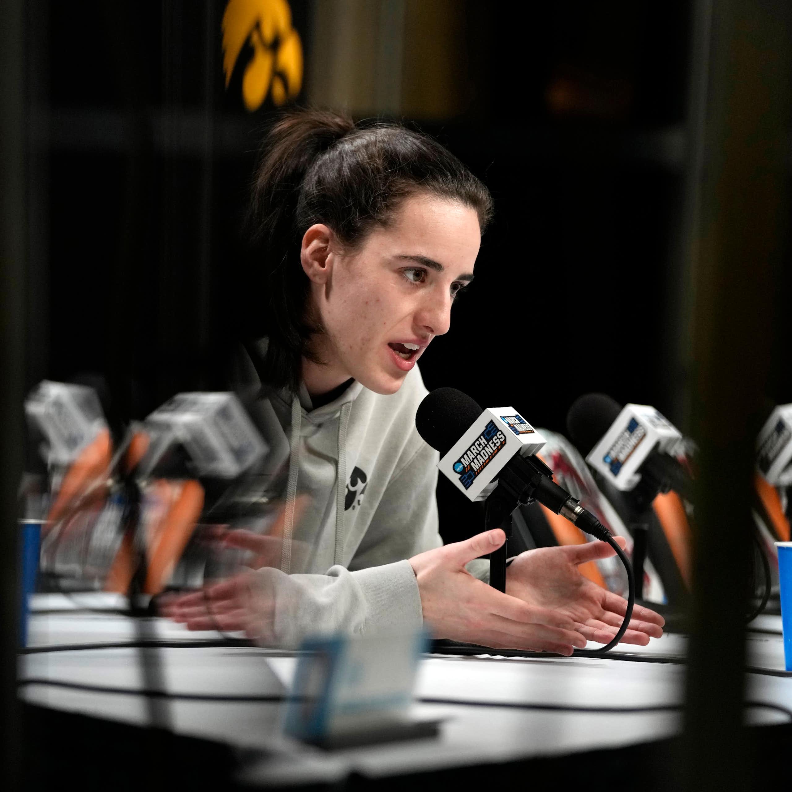 Iowa basketball star Caitlin Clark speaks during a press conference