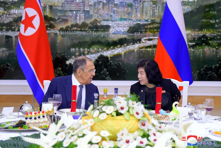 Russian foreign minister, Sergey Lavrov, speaking with North Korean foreign minister, Choe Son-hui, at a dinner in Pyongyang.