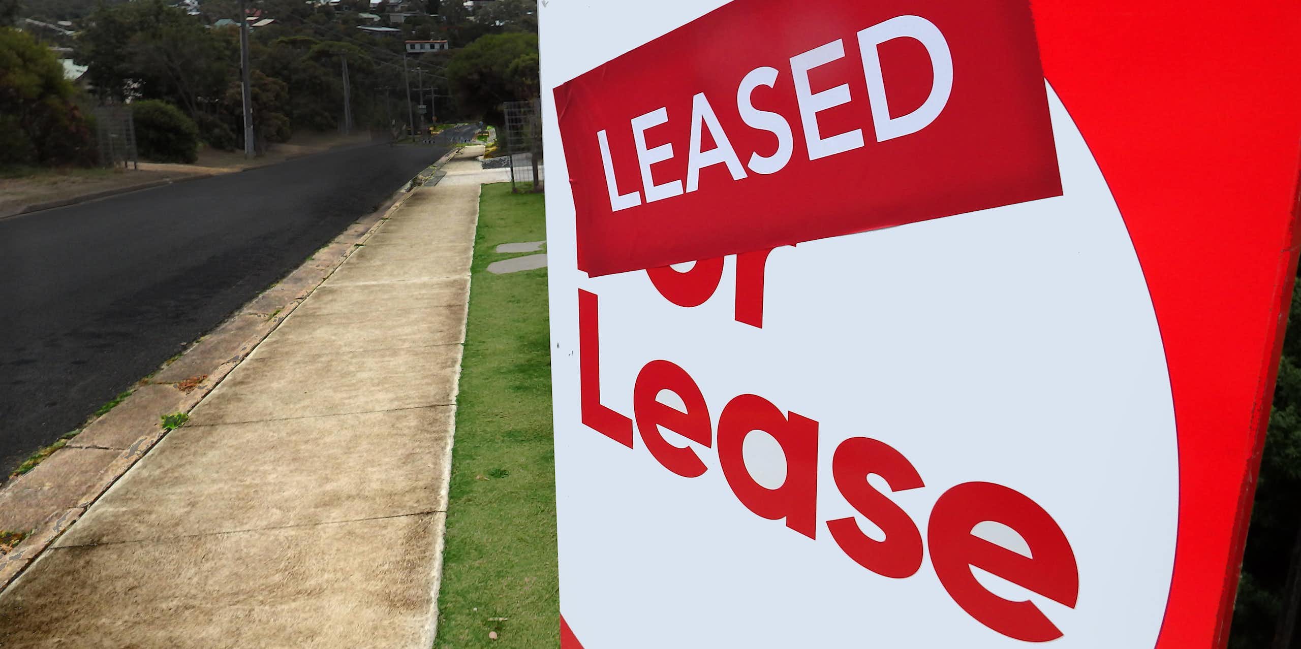 Large sign at front of property saying ''leased'' 