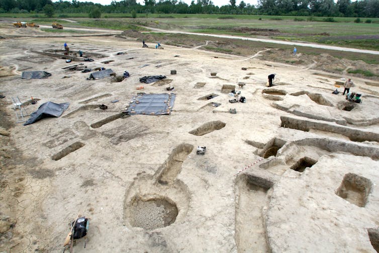 Photo showing excavation of a cemetery.