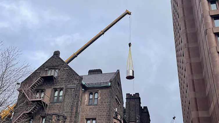 The powerful magnet is moved to the lab at Yale.