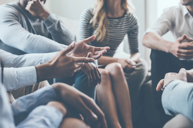 Group of people in discussion