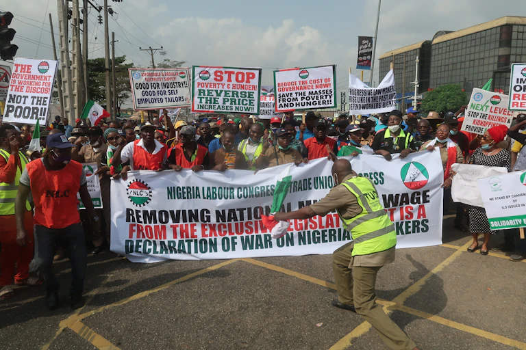A group of people carrying placards and banners