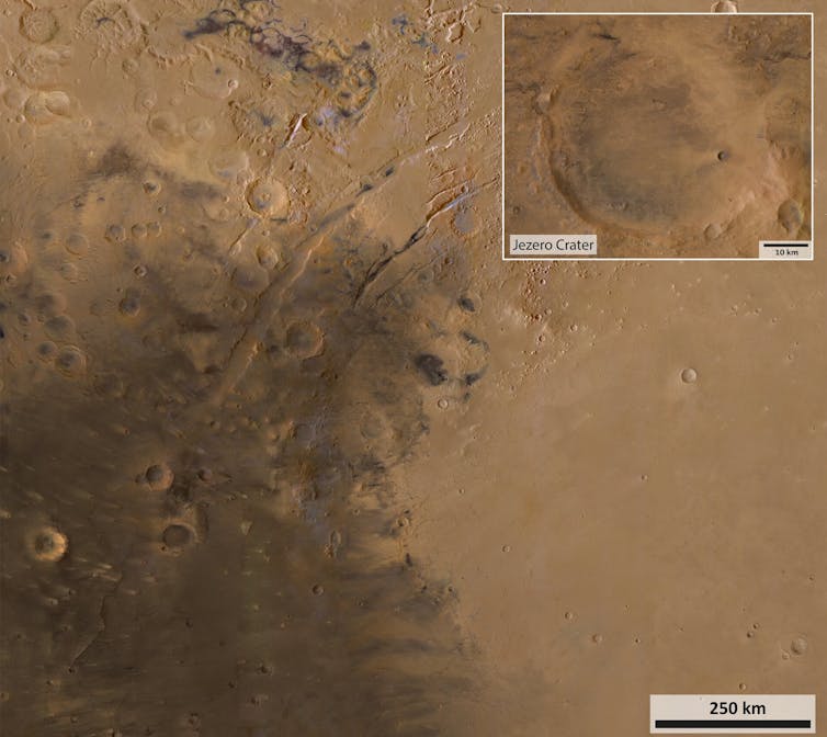 An overhead view of a sandy crater.