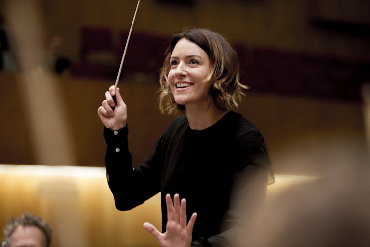 Portrait of Alondra de la Parra, current principal and artistic director of the ORCAM foundation, the Orchestra and Choir of the Community of Madrid.  Photography by Felix Broede.
