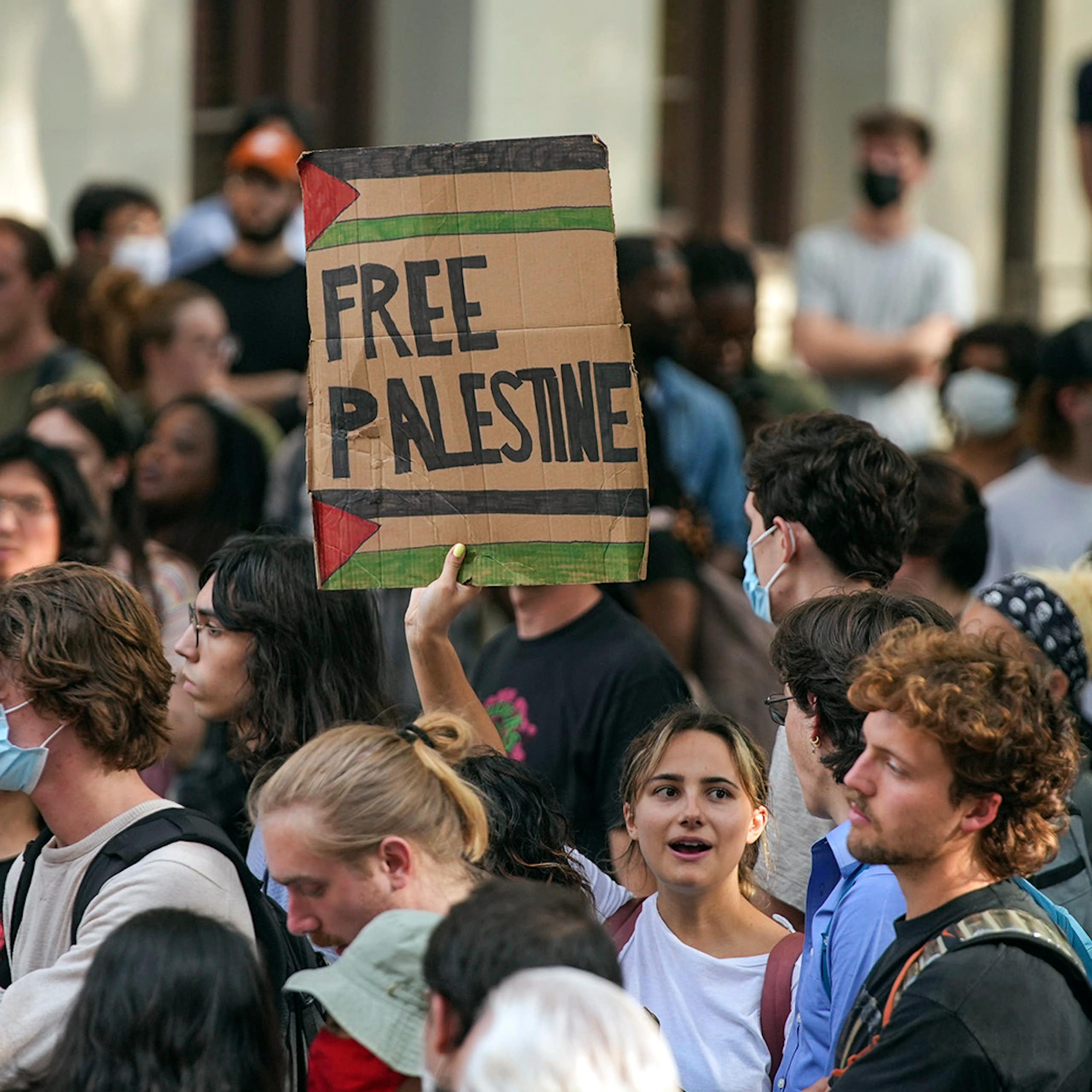 A sign says 'Free Palestine' at a protest.
