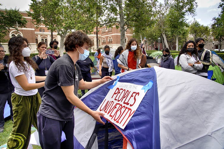 Students with tents.