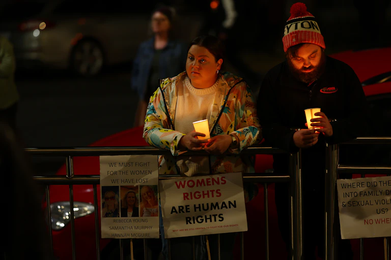 Members of the Ballarat community participate in a rally against men's violence following the alleged murder of three women in the regional Victorian city within the past three months.