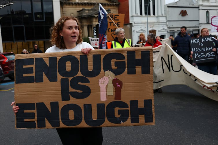 Members of the Ballarat community participate in a rally against men's violence following the alleged murder of three women in the regional Victorian city within the past three months