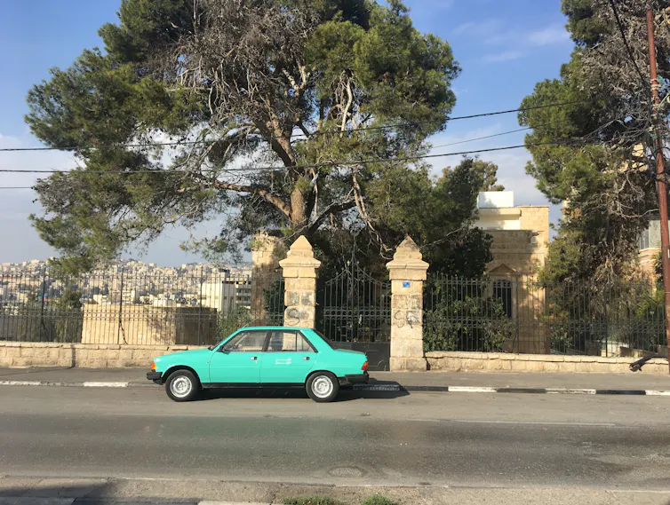 A blue Peugeot photographed in Gaza