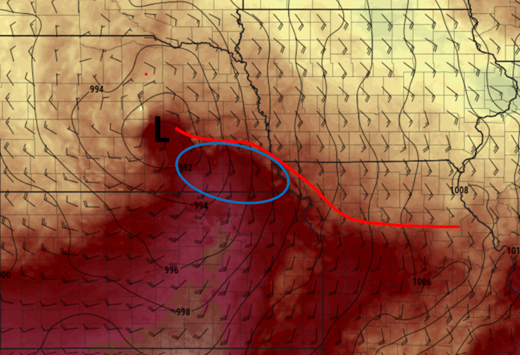 A map with wind direction and temperature shows the warm front over Nebraska and Iowa, where the tornadoes developed.