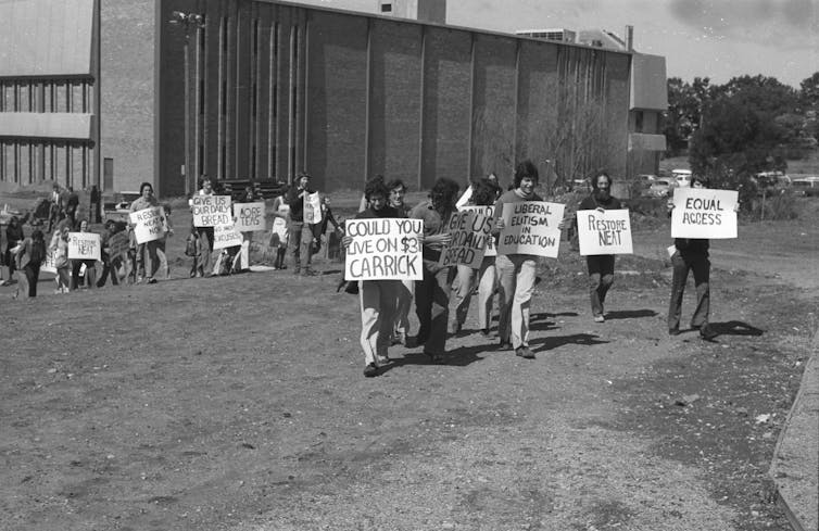 Black and white photo. Students protest.