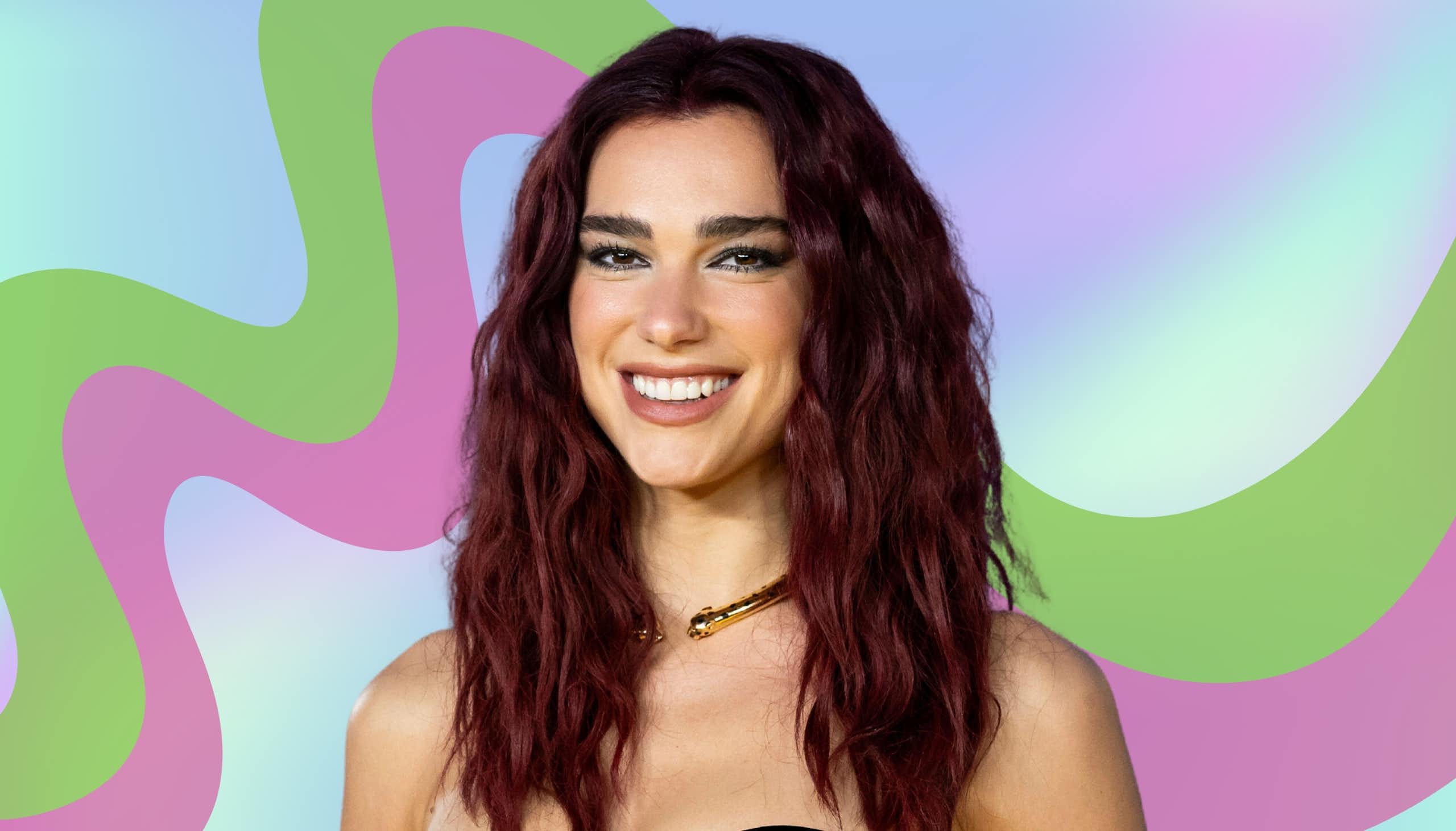 Dua Lipa smiling with a pattern behind her