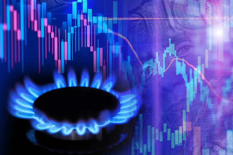 blue gas ring flames lit, background with computer generated pink and blue stock chart graph to indicate rising costs