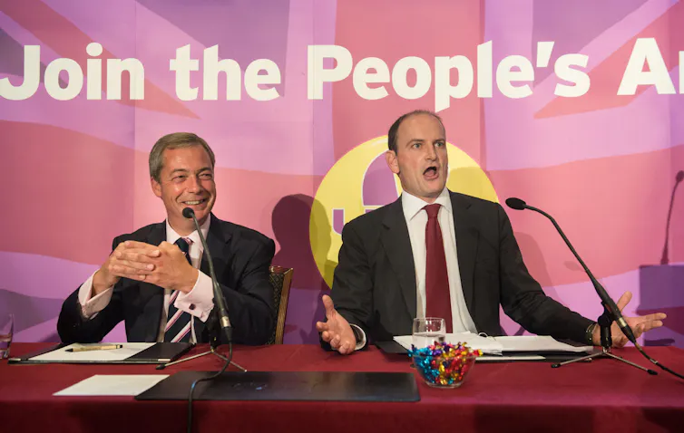 Douglas Carswell and Nigel Farage giving a press conference.