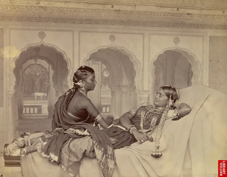 Two women lounging.