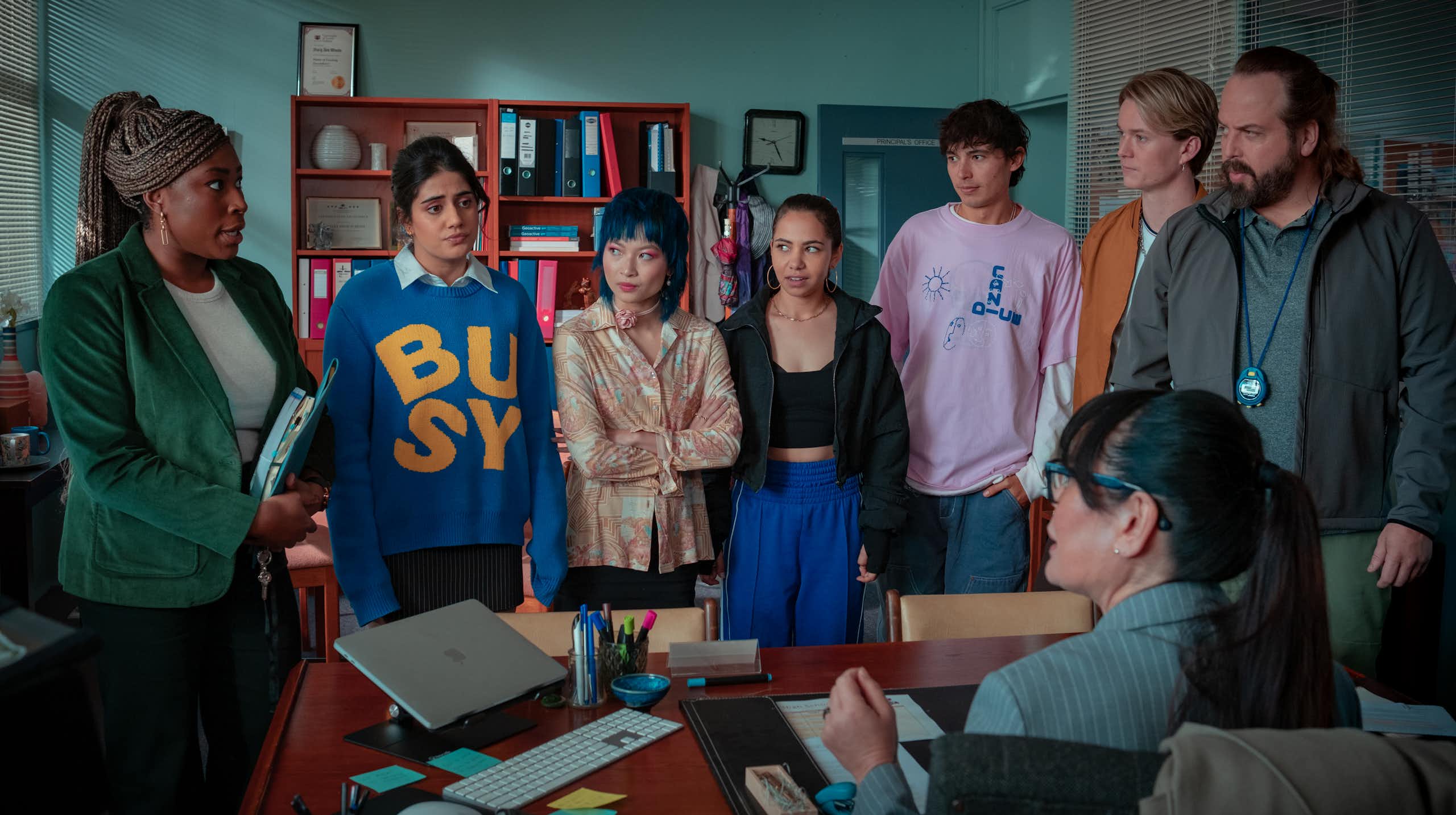 Production image. Students in the principal's office.