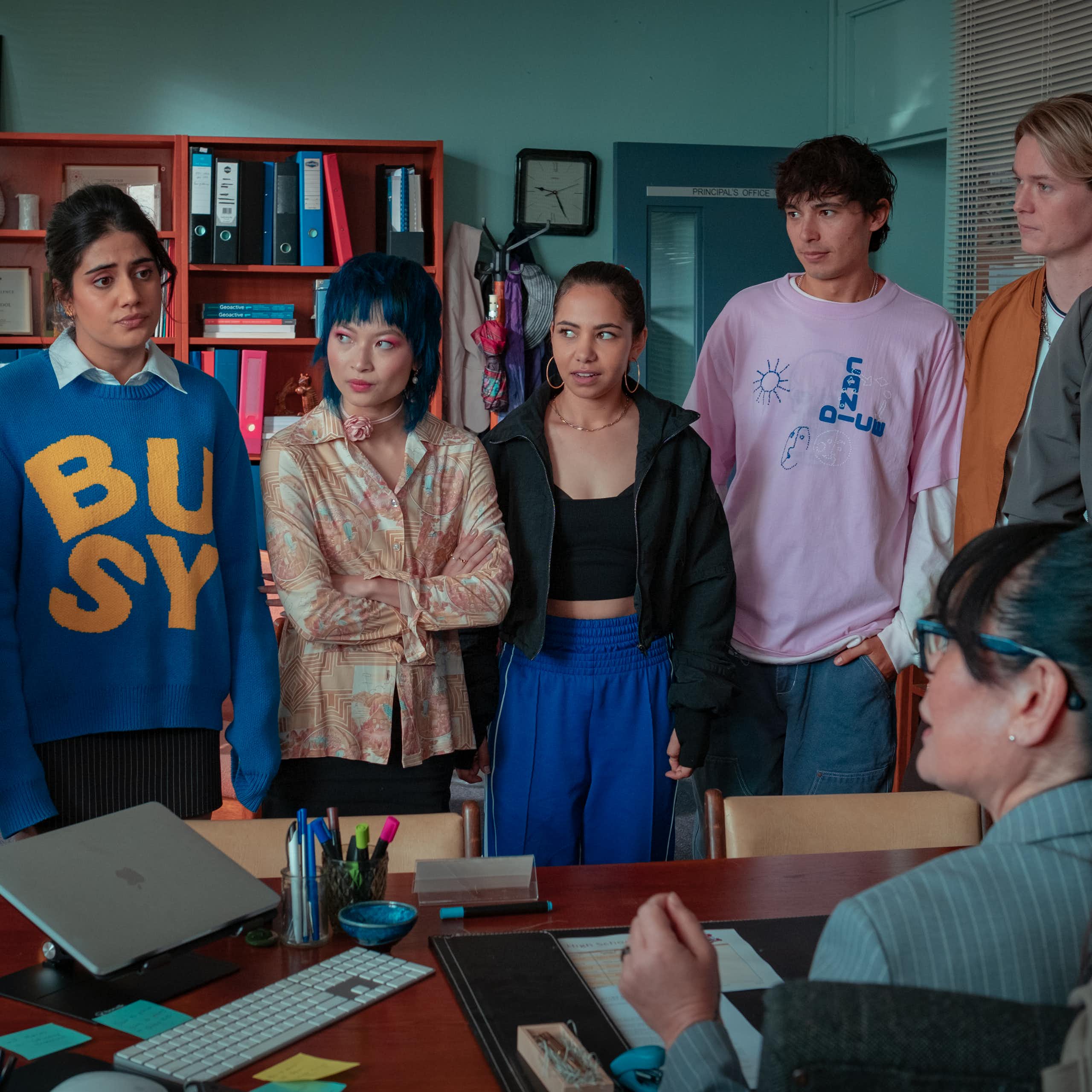 Production image. Students in the principal's office.