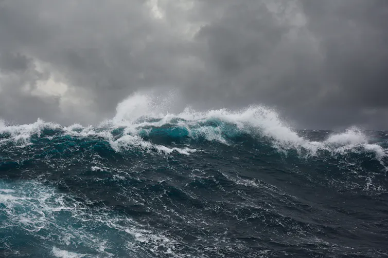 Large ocean wave, stormy sky