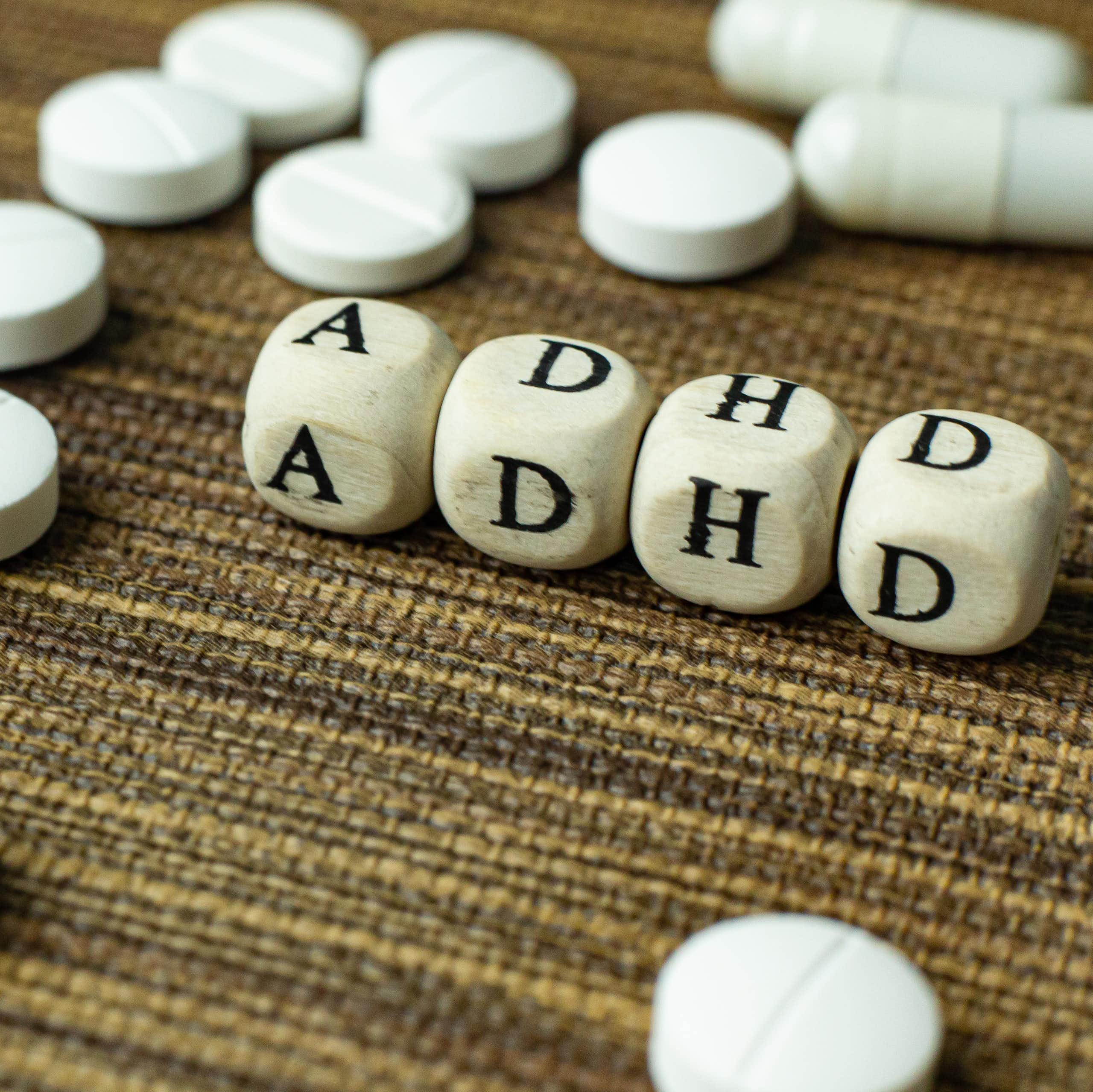 ADHD letters surrounded by pills
