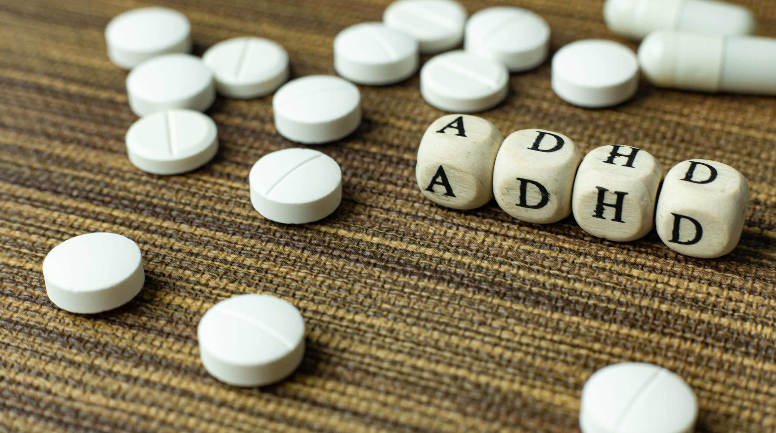 ADHD letters surrounded by pills