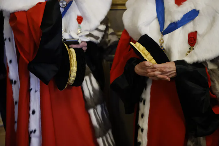 Des juges attendent avant une audience solennelle à la Cour de cassation, l’une des quatre juridictions de dernier ressort en France, le 10 janvier 2022 à Paris