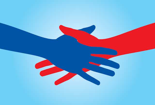A red hand shaking a blue hand.